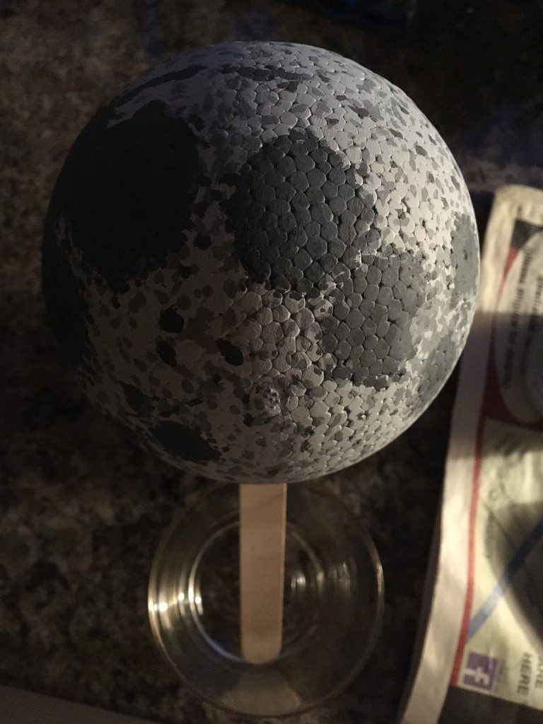 A completed Moon model, decorated to look similar to the real Moon.
